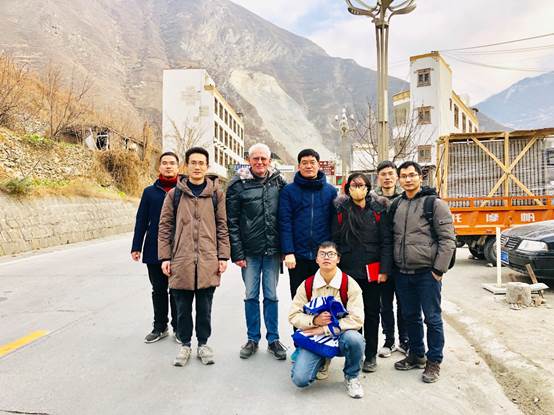 A group of people posing for a photoDescription automatically generated with medium confidence A group of people posing for a photoDescription automatically generated with medium confidence